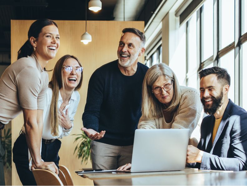 Group of people working on laptop