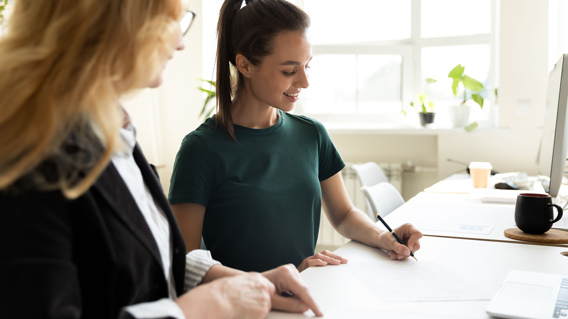 HR manager discussing health insurance plans