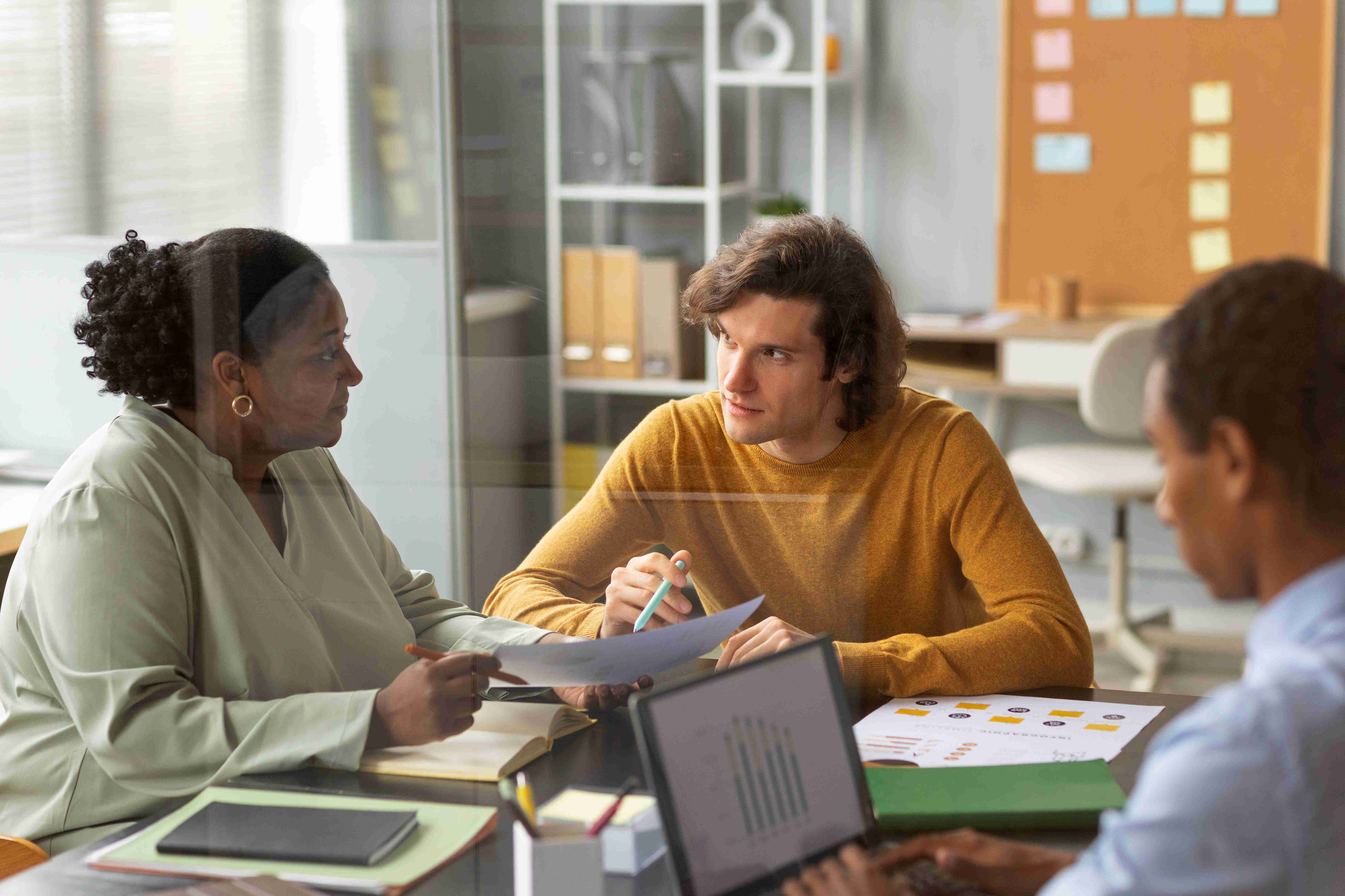 Employers discussing CMS updates, image by Freepiks.