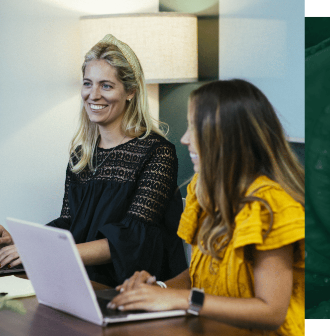 Two women talking in an office